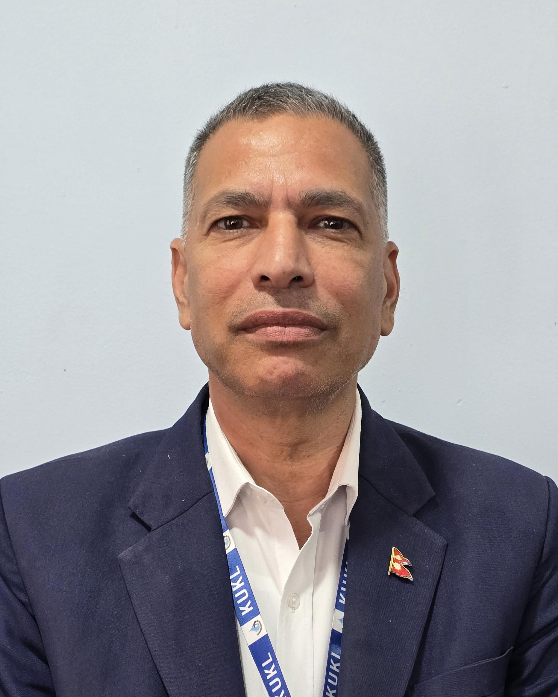 Mr. Yogendra Bahadur Bam